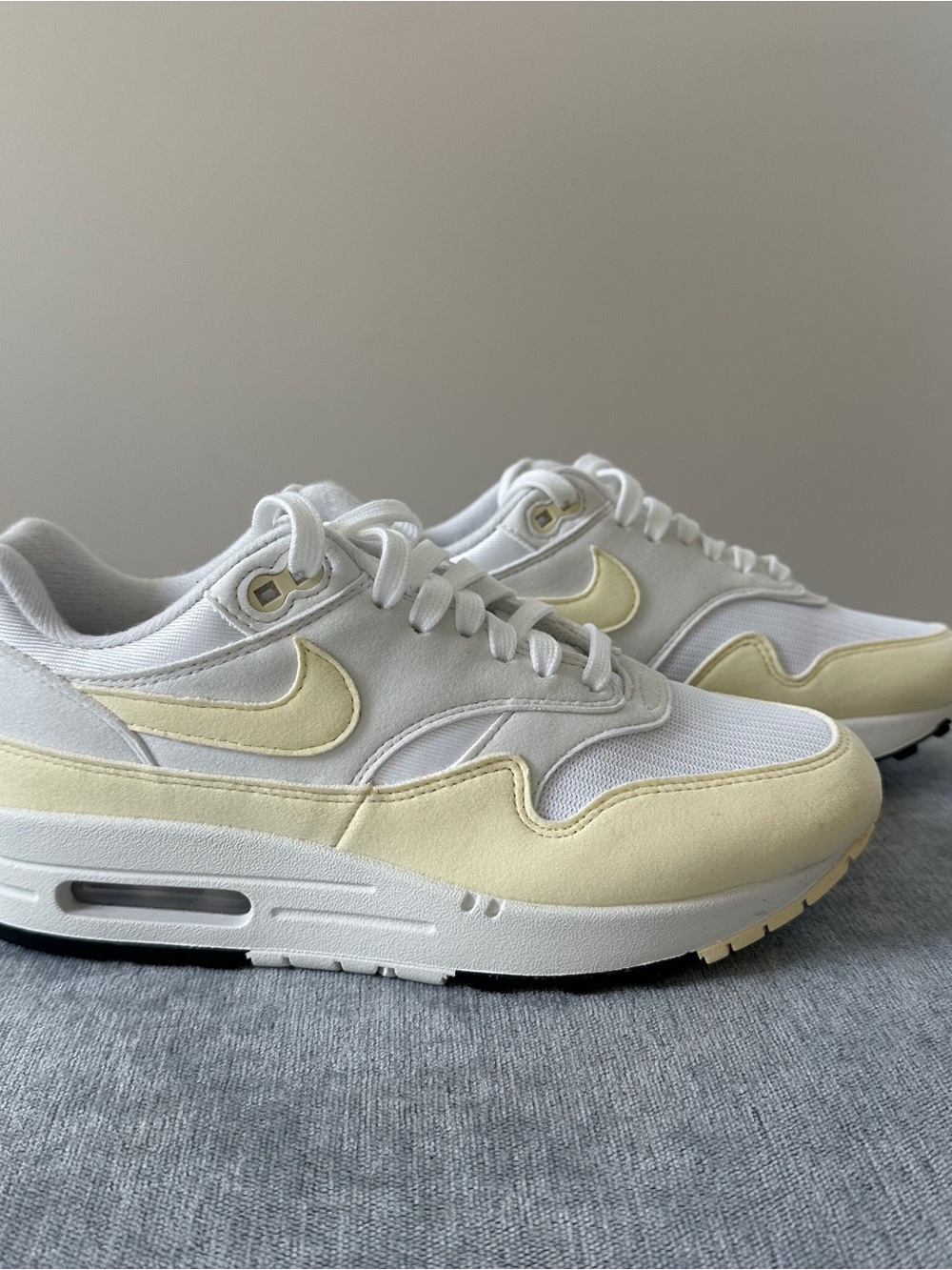 Nike White Sneakers with Pale Yellow Accents